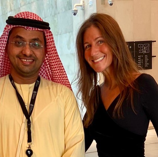 Korie Minkus with a business leader in Abu Dhabi
