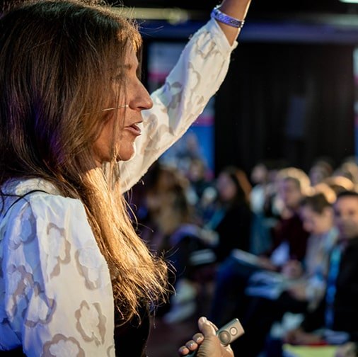 Korie Minkus leading a live training in Tel Aviv